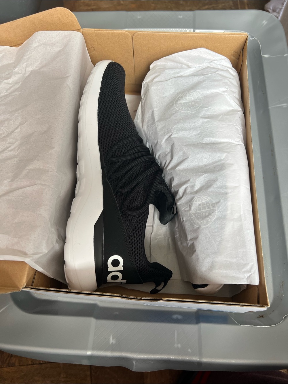 adidas Black and White Knit Slip-On Athletic Sneaker